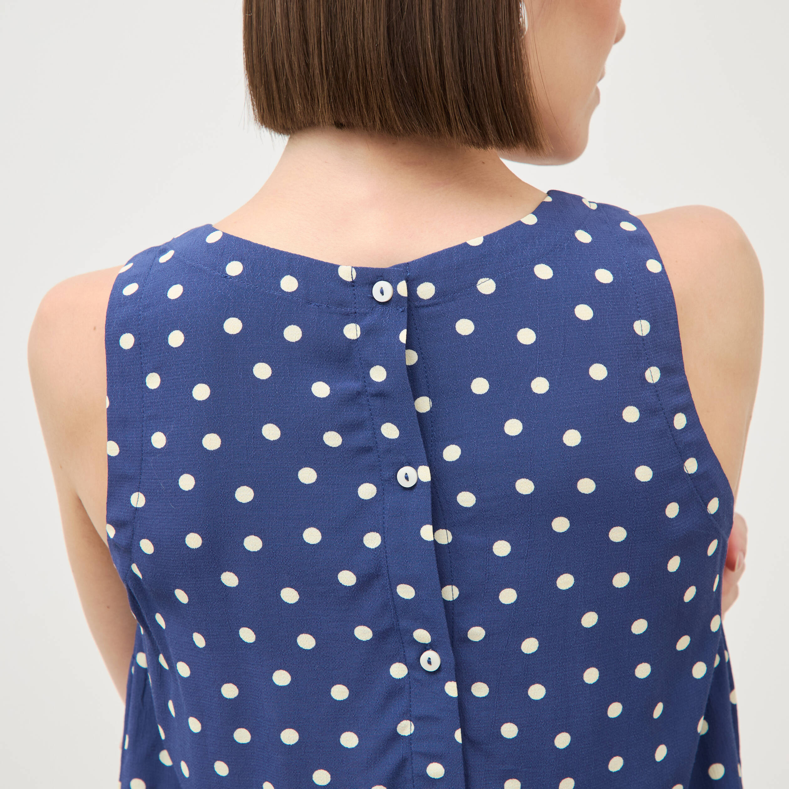 Top sans manches bleu marine femme