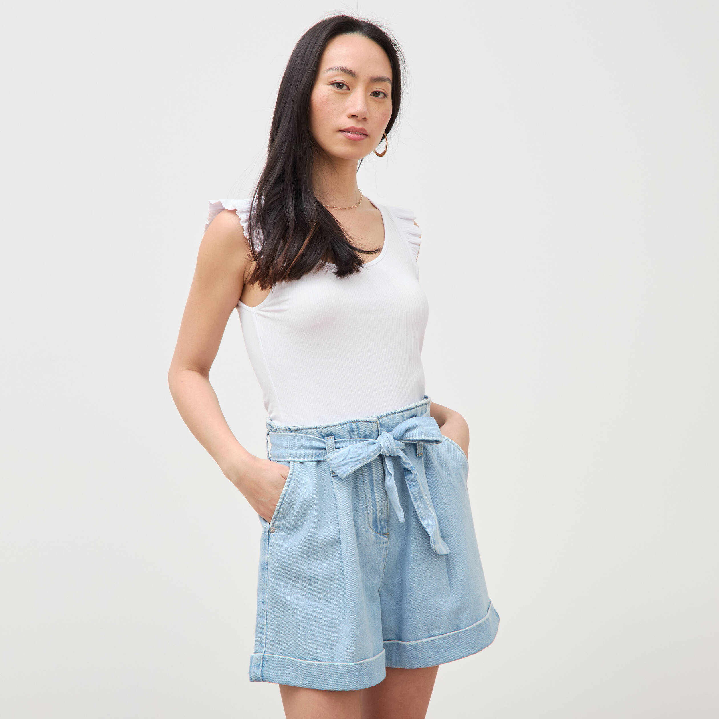 Short taille haute en jeans denim bleach femme