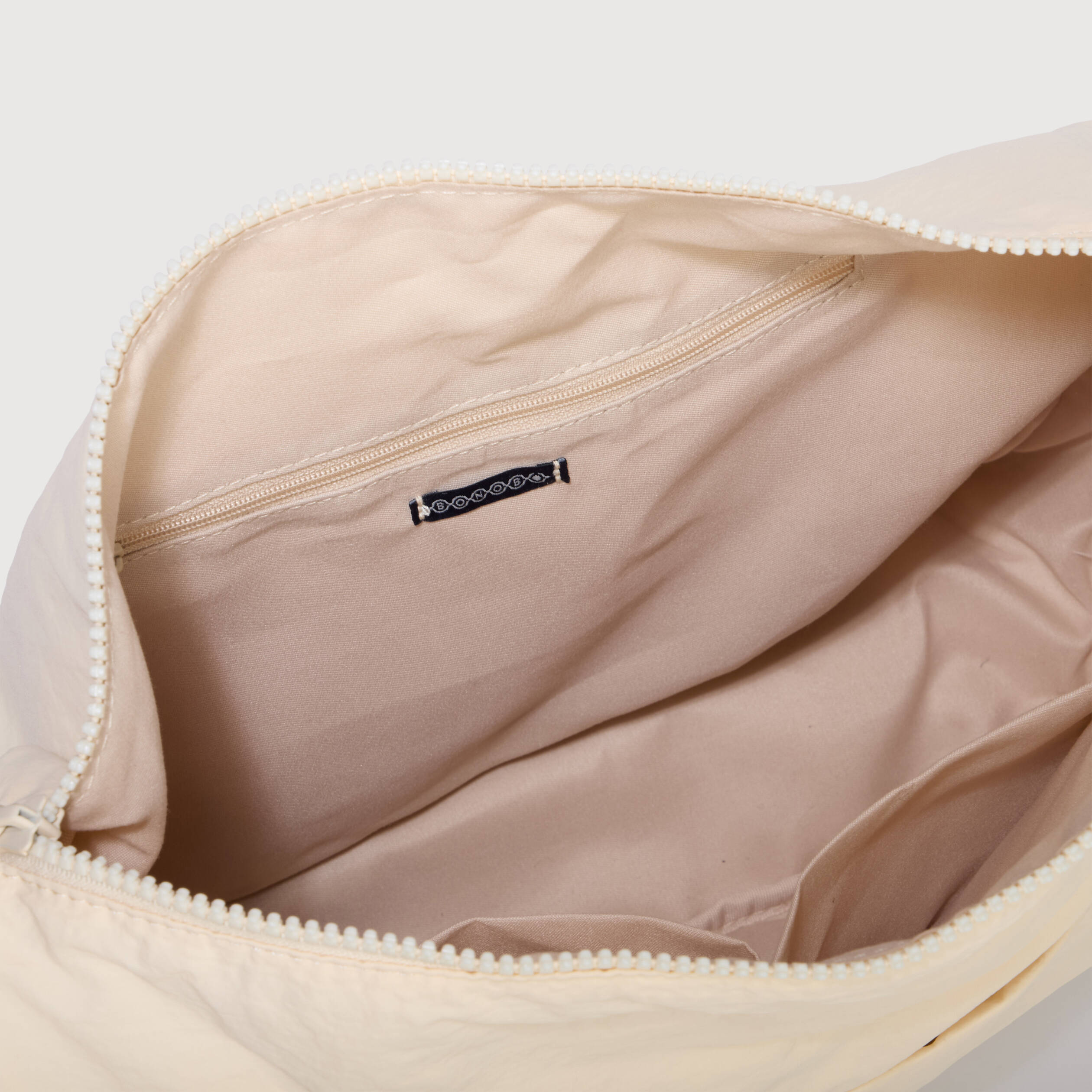 Besace bandouli&egrave;re pliss&eacute;e creme femme