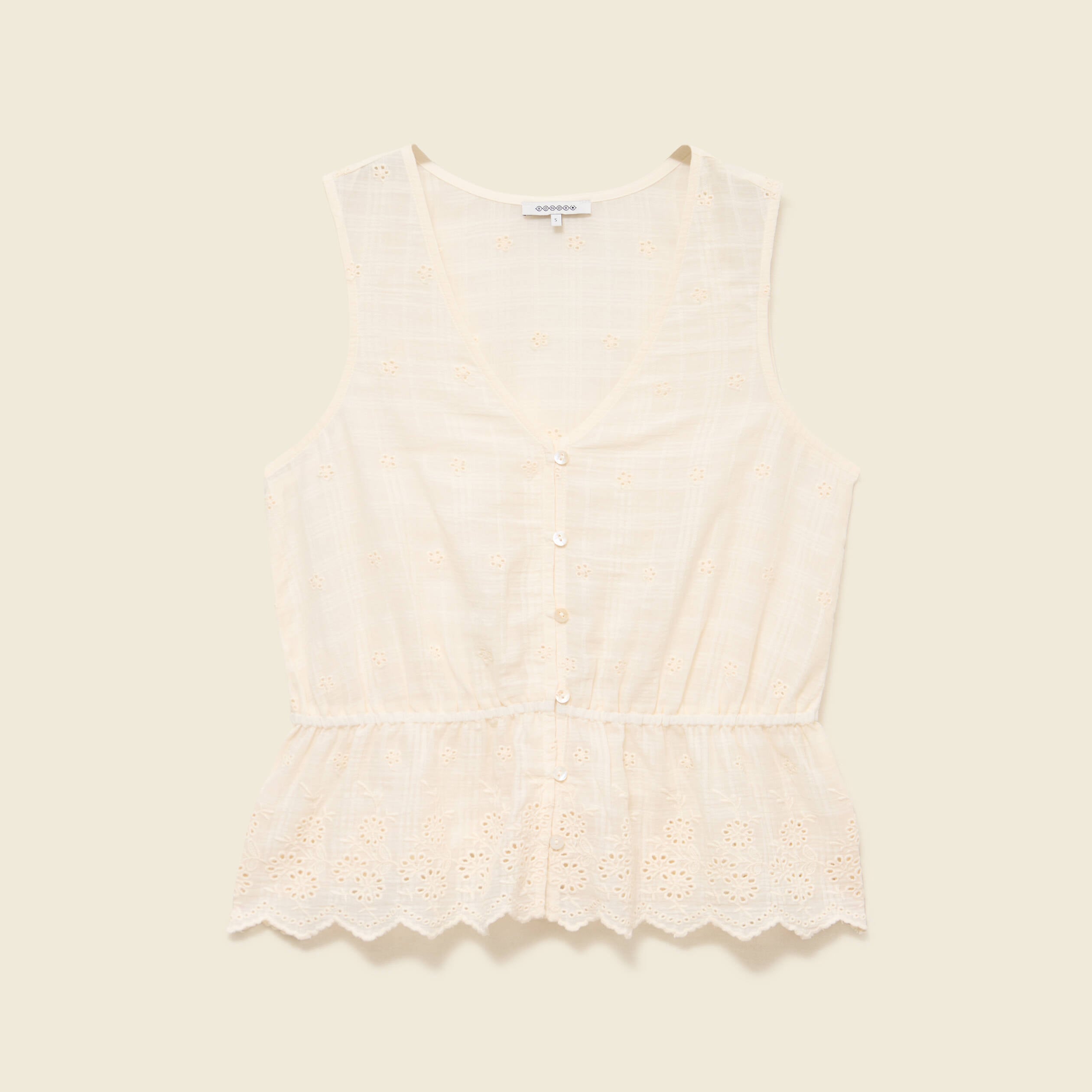 Top col v sans manches en coton creme femme