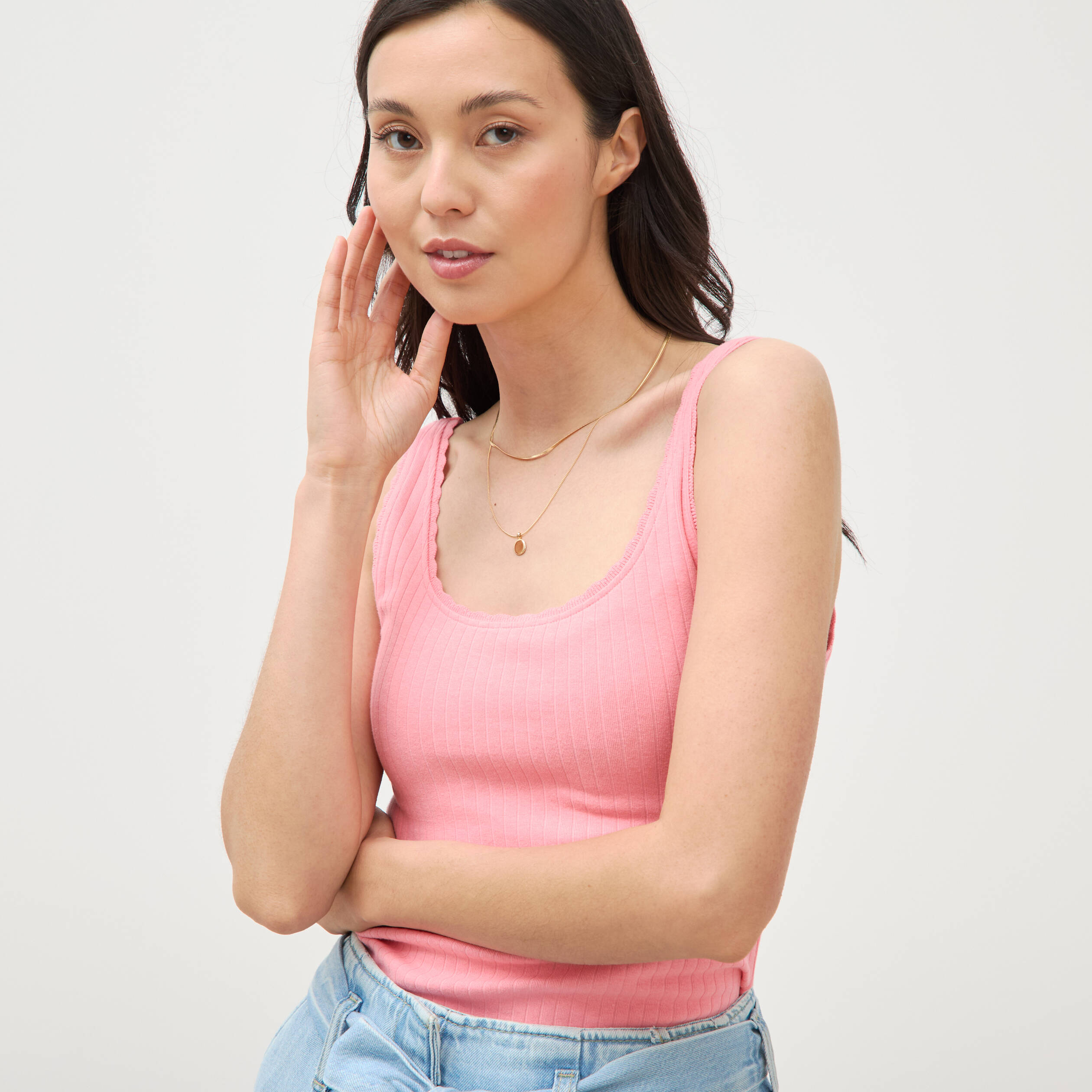 D&eacute;bardeur sans manches c&ocirc;tel&eacute; rose femme