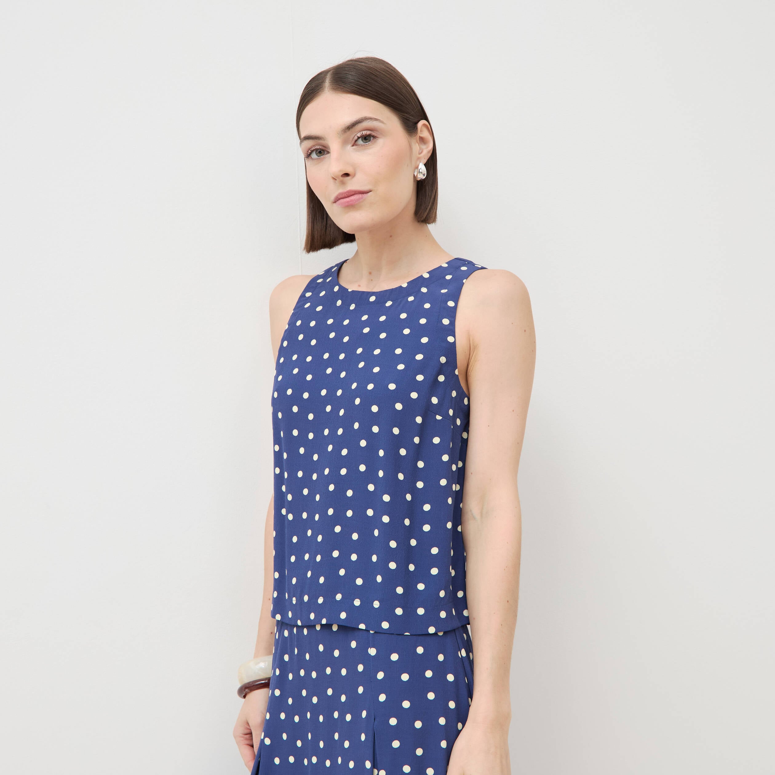 Top sans manches bleu marine femme
