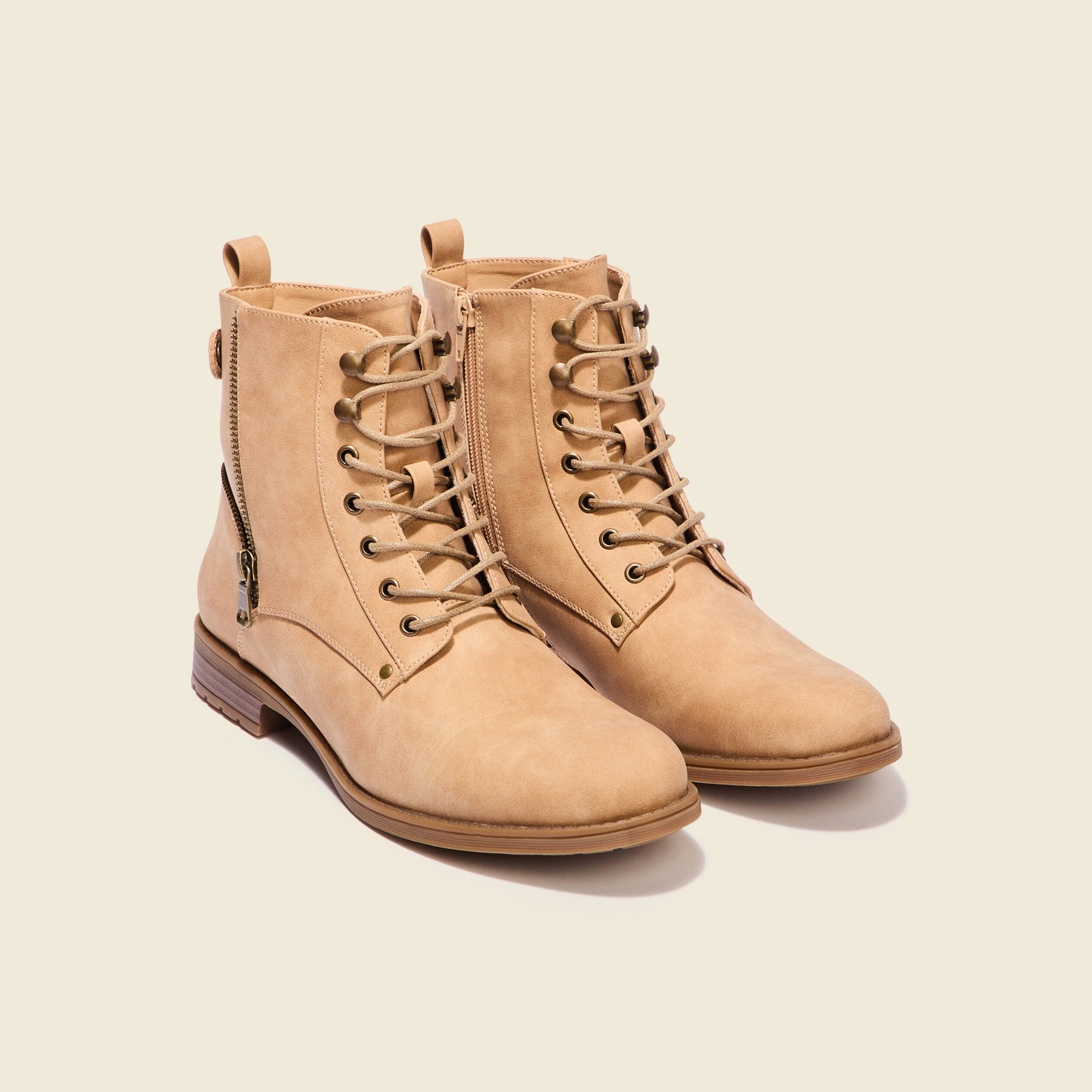 bottines avec details zippes beige femme Bottines avec détails zippés beige femme
