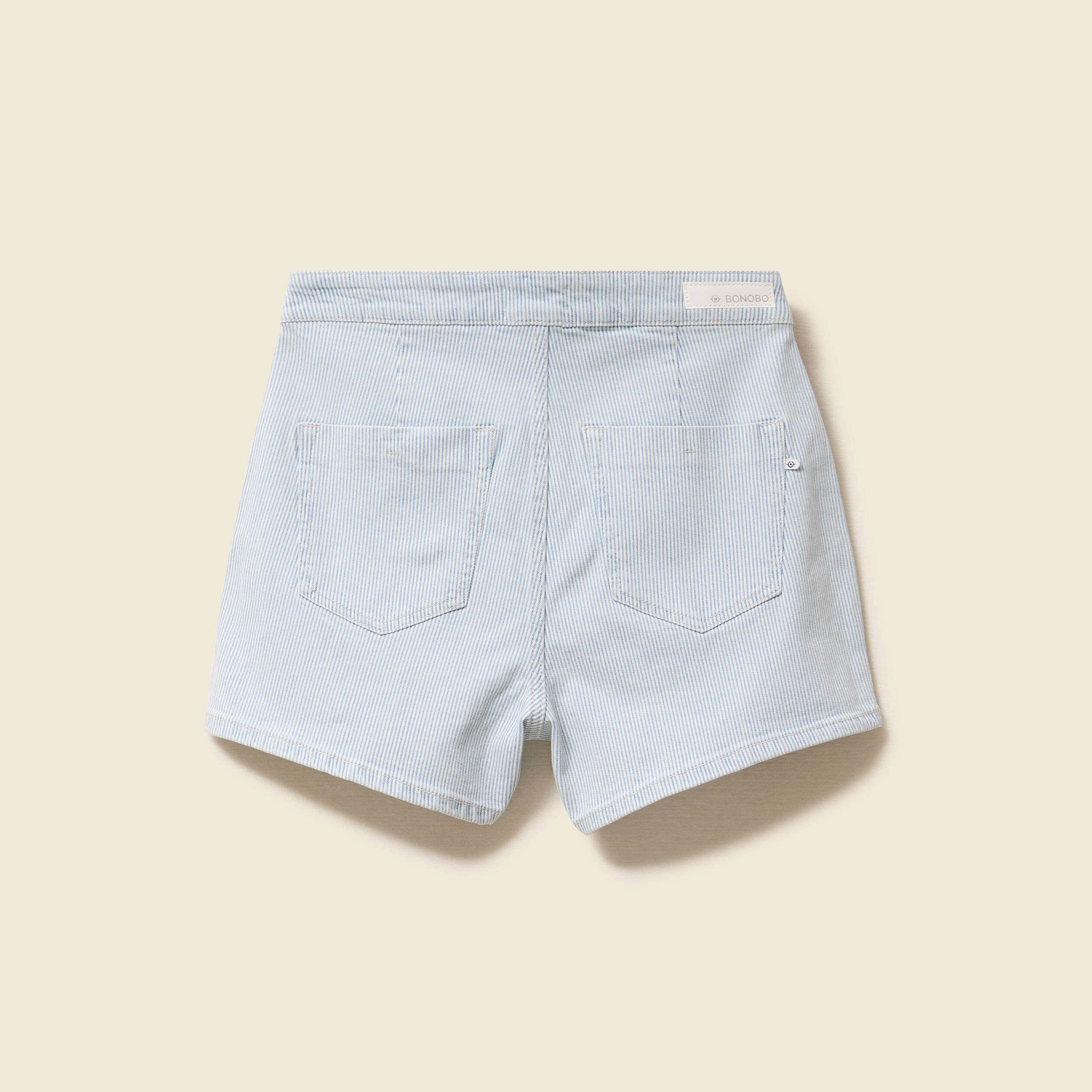Jupe-short taille haute en jeans denim bleach femme