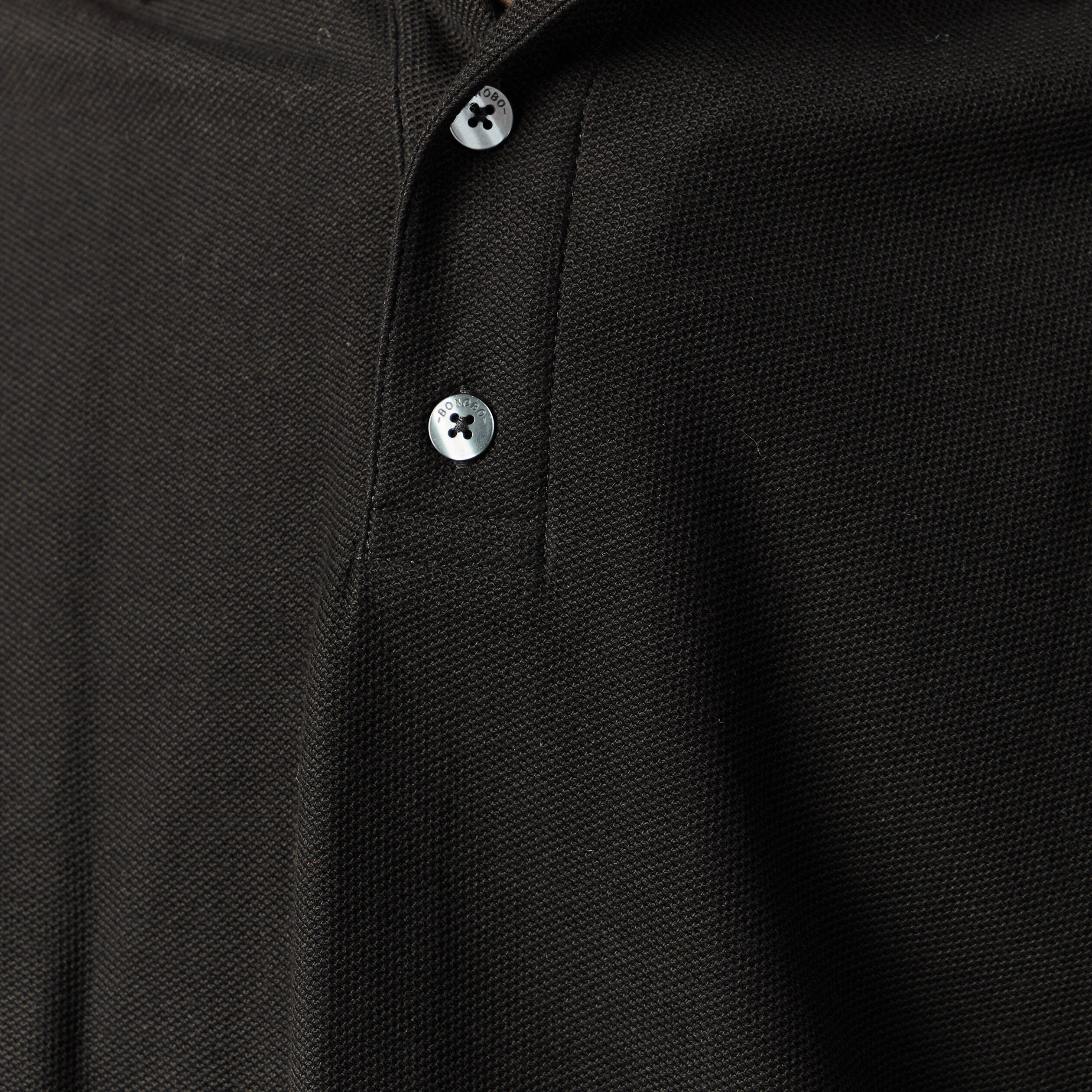 Polo manches longues en coton noir homme